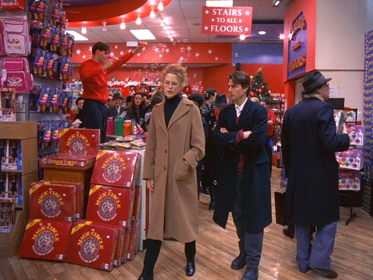 Alice &amp; Bill in the toyshop scene; objects in the store reflect things that appear earlier in  Eyes Wide Shut , like the “Magic Circle” game (1999)